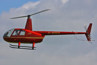 G-HOCA @ EGBT - being used for ferrying race fans to the British F1 Grand Prix at Silverstone - by Chris Hall