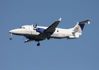 N87555 @ MCO - United Express Beech 1900D - by Florida Metal