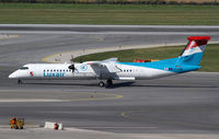 LX-LGM @ LOWW - Luxair DHC-8 - by Thomas Ranner