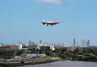 D-ALPJ @ MIA - Air Berlin landing over Dolphin Expressway with Downtown Miami in the distance - by Florida Metal