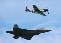 N351DT - Crazy Horse 2 with F-22 over Cocoa Beach - by Florida Metal