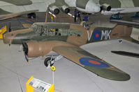 N4877 @ EGSU - Avro 652A Anson I. In the AirSpace hangar, Imperial War Museum Duxford, July 2013. - by Malcolm Clarke