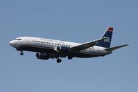 N438US @ MCO - US Airways 737-400 - by Florida Metal