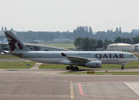 A7-AFZ @ AMS - Taxi to the Cargo gate of Schiphol Airport - by Willem Göebel