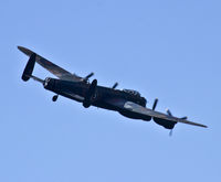PA474 - BoBMF Lancaster B1 flying past our house whilst doing at isplay at the Wales National Airshow Swansea, Flight Crew for the day were, Capt: F/L Tim (Twigs) Dunlop / Co-Pilot: Fl Lt Loz Rushmere / Nav:Sqn Ldr Russ Russell / Air Eng: Flt Sgt Archie Moffatt. - by Derek Flewin