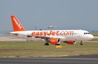 G-EZUP @ EGCC - Not on the grass but actually the taxi way. - by Graham Reeve