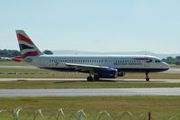 G-EUYA @ EGCC - British Airways Airbus A320 Taxiing at Manchester Airport. - by David Burrell