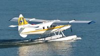 C-GOPP @ CYHC - Harbour Air #305 taxiing for takeoff in Coal Harbour. - by M.L. Jacobs