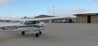 N12509 @ KGFK - Cessna 172M Skyhawk parked in front of GFK Flight Support. - by Kreg Anderson