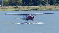 C-FAOP @ CYVR - Saltspring Air Beaver just landed at YVR Seaplane Terminal on the Fraser River. - by M.L. Jacobs