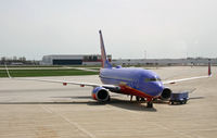 N458WN @ KCMH - A Southwest 737-700 gets a brief respite on the ramp at Port Columbus International - by Daniel L. Berek