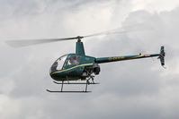 G-DODB @ EGBR - Robinson R22 Beta at The Real Aeroplane Company's Wings & Wheels Fly-In, Breighton Airfield, July 2013. - by Malcolm Clarke