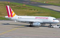 D-AGWM @ EDDK - Germanwings A319 pushed back - by FerryPNL