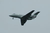 CS-DRX @ EGCC - Raytheon Hawker CS-DRX on approach to Manchester Airport. - by David Burrell