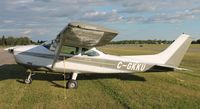 C-GKKU @ KAXN - Cessna 182P Skylane in overflow parking. - by Kreg Anderson