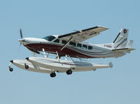 C-GCGA @ YKZ - This 1995 Cessna 208 prepares to land on Runway 33 at Buttonville Airport (YKZ) on a nice cloudless day. - by Ron Coates