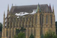 G-OCCG @ EGKA - with the Chapel of Saint Mary and Saint Nicolas making an impressive background - by Chris Hall