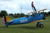 G-CCXA @ EGML - wing walking at Daymn's Hall Farm, Upminster, Essex - by Chris Hall