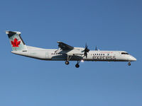C-GGFP @ CYYZ - This Air Canada 2012 Dash 8 - 402 is landing in the late afternoon on runway 24R at Toronto Int'l Airport (YYZ) - by Ron Coates