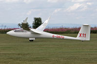 G-DKFU @ X5SB - Schempp-Hirth Ventus 2CT being launched for a cross country flight during The Northern Regional Gliding Competition, Sutton Bank, North Yorks, August 2nd 2013. - by Malcolm Clarke