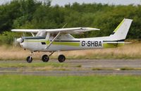 G-SHBA @ EGFH - Visiting Reims Cessna 152. Previously registered OO-SHB. - by Roger Winser