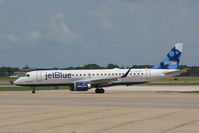 N324JB @ KSRQ - JetBlue Flight 164 (N324JB) Blue Traveller prepares for flight at Sarasota-Bradenton International Airport - by Donten Photography