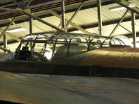 PA474 @ EGXC - The large cockpit canopy on the Avro Lancaster - by Chris Hall