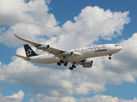 D-AIGC @ CYYZ - Air Alliance (Lufthansa) Airbus A340 landing on rwy 23 at Toronto Int'l Airport - by Ron Coates