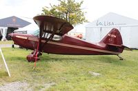 N97114 @ KOSH - Stinson 108-1 - by Mark Pasqualino