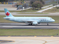 C-GPWG @ KTPA - This 1991 Air Canada Airbus 320 is about to rotate off rwy 19L at Tampa Int'l Airport (TPA)  - by Ron Coates