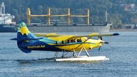 C-GEND @ CYHC - Whistler Air #321 taxiing out for takeoff in Coal Harbour. - by M.L. Jacobs