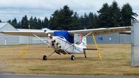 C-FTAL @ CYXX - This Canadian Air Cadets Cessna is tied down on the grass parking area. - by M.L. Jacobs
