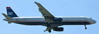N535UW @ KLAX - US Airways, is here on short finals RWY 24R at Los Angeles Int´l(KLAX) - by A. Gendorf