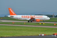 G-EZUH @ EGCC - EasyJet Airbus A320-214 taxiing Manchester Airport. - by David Burrell