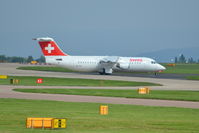 HB-IXU @ EGCC - Swiss BA Avro 146 RJ-100 taxiing Manchester Airport. - by David Burrell