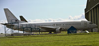 VN-A192 @ EGDX - Boeing 737-4Q8, ex Jetstar Pacific, parked outside the Twin Peaks Hangar. - by Derek Flewin