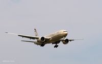 A6-ETL @ KJFK - Coming to a landing on 22L @ JFK - by Gintaras B.