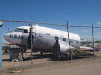 43-15957 - Stored at the closed Stapleton Airport, Denver - by Philip Cole