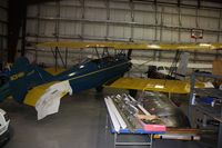 N648H @ OSH - 1929 Curtiss Wright TRAVEL AIR E-4000, c/n: 1224.  In the EAA Kermit Weeks Hangar - by Timothy Aanerud