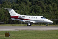 N520RB @ ORF - BBR Music Group 2013 Embraer EMB-500 Phenom 100 N520RB rolling out on RWY 23 after arrival from John C Tune Airport (KJWM) - Nashville, TN. - by Dean Heald
