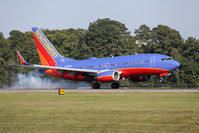 N948WN @ ORF - Southwest Airlines 2010 Boeing 737-7H4 N948WN (FLT SWA1421) from Orlando Int'l (KMCO) landing RWY 23. - by Dean Heald