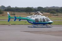 N199F @ EGFH - Visiting Bell 407. - by Roger Winser