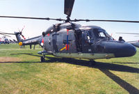 283 @ EGDM - SH-14D Lynx , callsign NRN 705, of 860 Squadron Royal Netherlands Navy on display at the 1992 Air Tournament International at Boscombe Down. - by Peter Nicholson