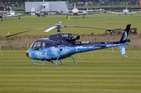 G-OOIO @ EGHR - AS350 during Goodwood Revival 2013 - by FerryPNL