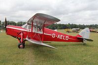 G-AELO @ X1WP - De Havilland DH-87B Hornet Moth at The De Havilland Moth Club's 28th International Moth Rally at Woburn Abbey. August 2013. - by Malcolm Clarke