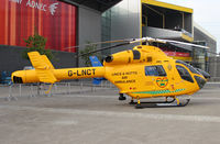 G-LNCT @ EGLC - Parked outside Helitech 2013 at the Excel Centre next to London City Airport. - by Graham Reeve