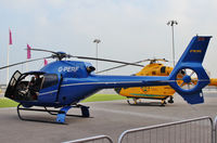 G-PERF @ EGLC - Parked outside Helitech 2013 at the ExCel Centre, next to London City Airport.
