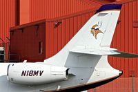 N18MV @ EGGW - Tail Logo on 1996 Dassault Aviation FALCON 2000, c/n: 24 - by Terry Fletcher