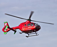 G-WASN @ EGFH -  Wales Air Ambulance Helimed 57, returning from a Red Call from the east. - by Derek Flewin