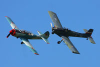 G-TYAK @ EGBR - G-TYAK Betsy Yak-52 and G-BSXD Soko P-2 Kraguj at Breighton's Heli Fly-in, 2013 - by Chris Hall